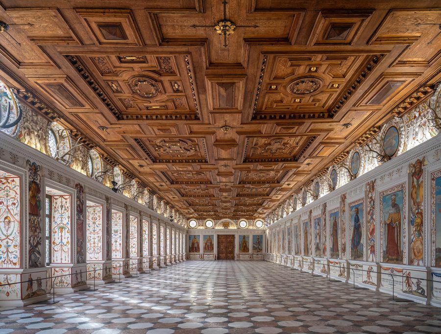 The Spanish Hall inside Ambras Castle in Innsbruck, a historic cultural sight.