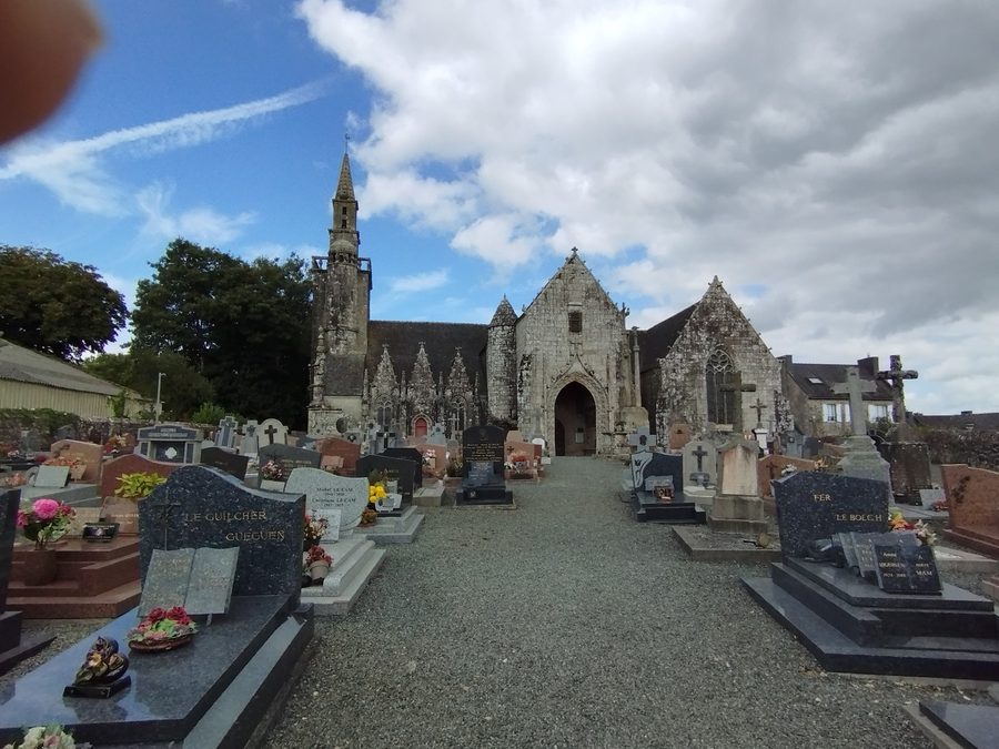 Cemetery and southern facade of the Saint-Jean-Baptiste Church in Plourac'h