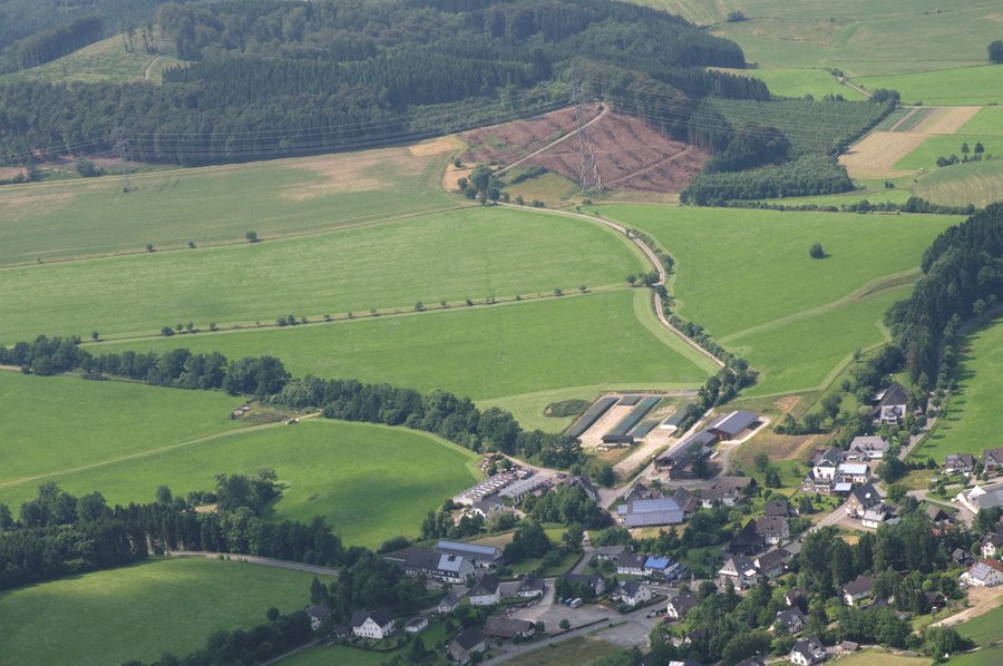 Aerial view of Niederberndorf in the Wenne Valley with Buchholz mountain in the background