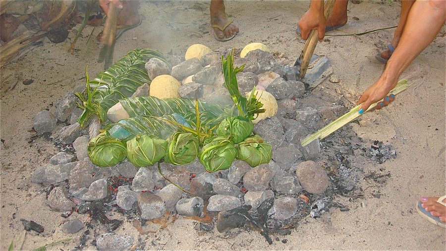 Preparing an Umu in Samoa