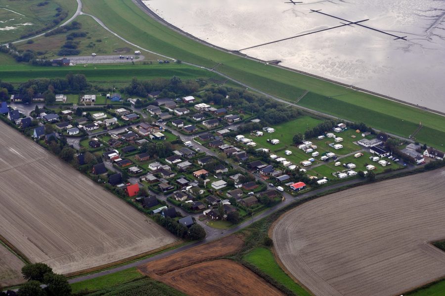 Aerial view of the coastal and marsh landscape near Warwerort in the district of Dithmarschen