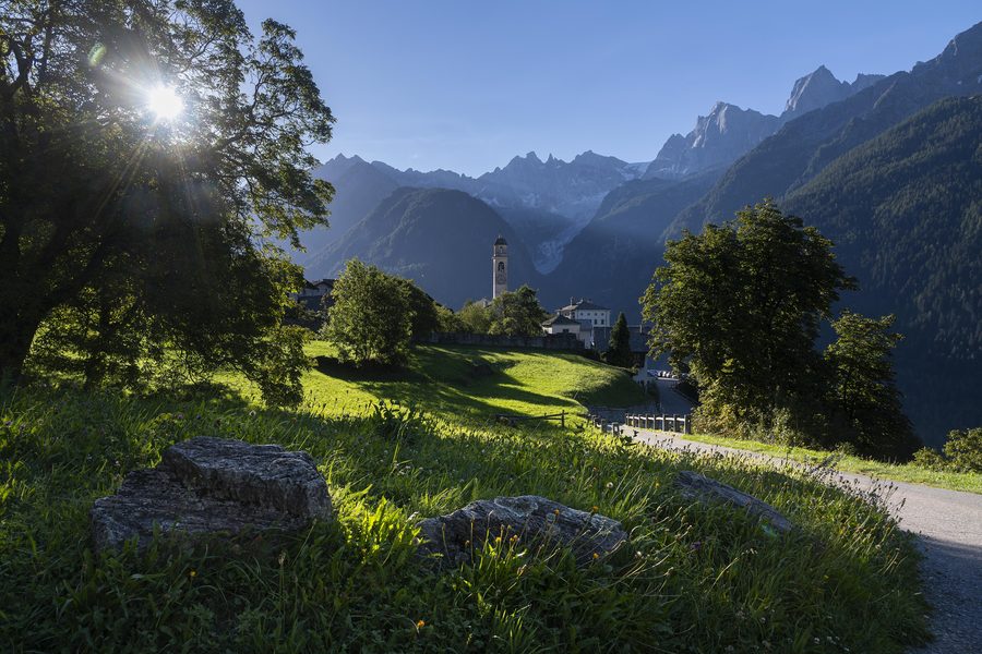Soglio in the early morning with mountains in the background
