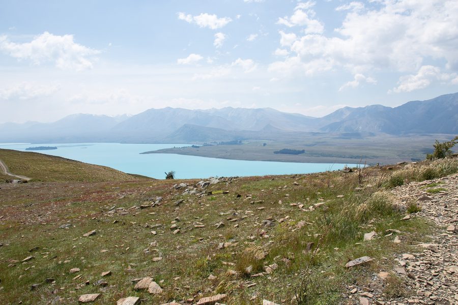 Turquoise Lake Tekapo in front of a mountain landscape on New Zealand's South Island.