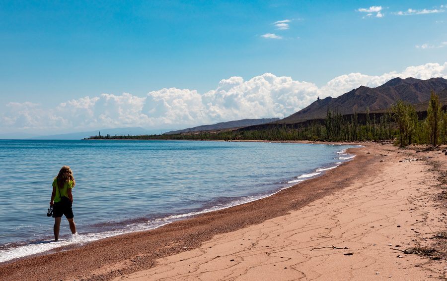 Issyk-Kul Lake with the Tian Shan mountains in the background.