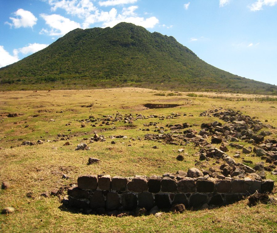 View from the grounds of Battery St. Louis toward the vegetated volcano The Quill on Sint Eustatius