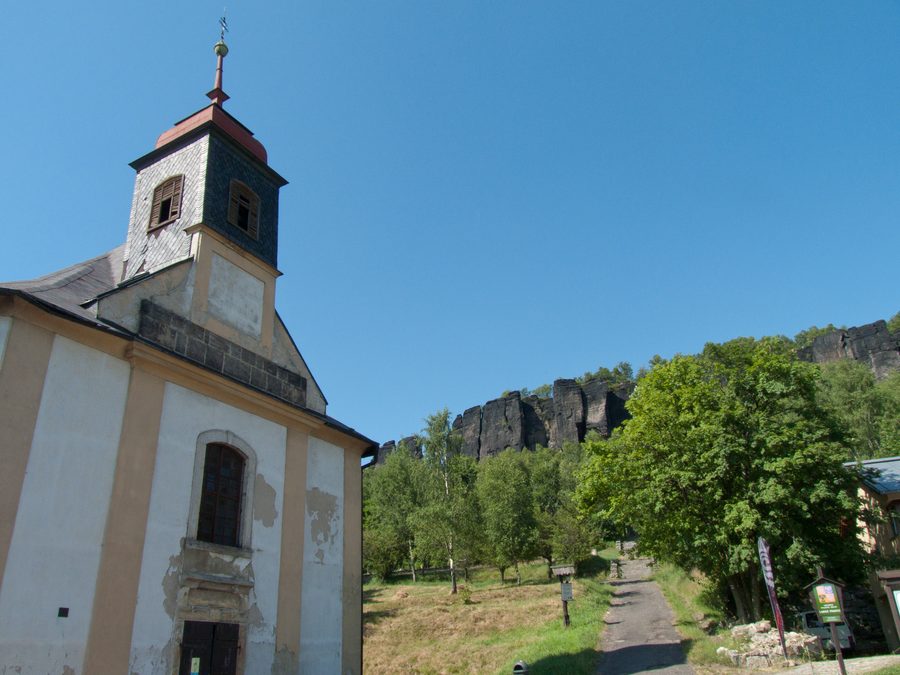 Sandstone rocks of the Tiské stěny near Tisá, seen from St. Anne's Church