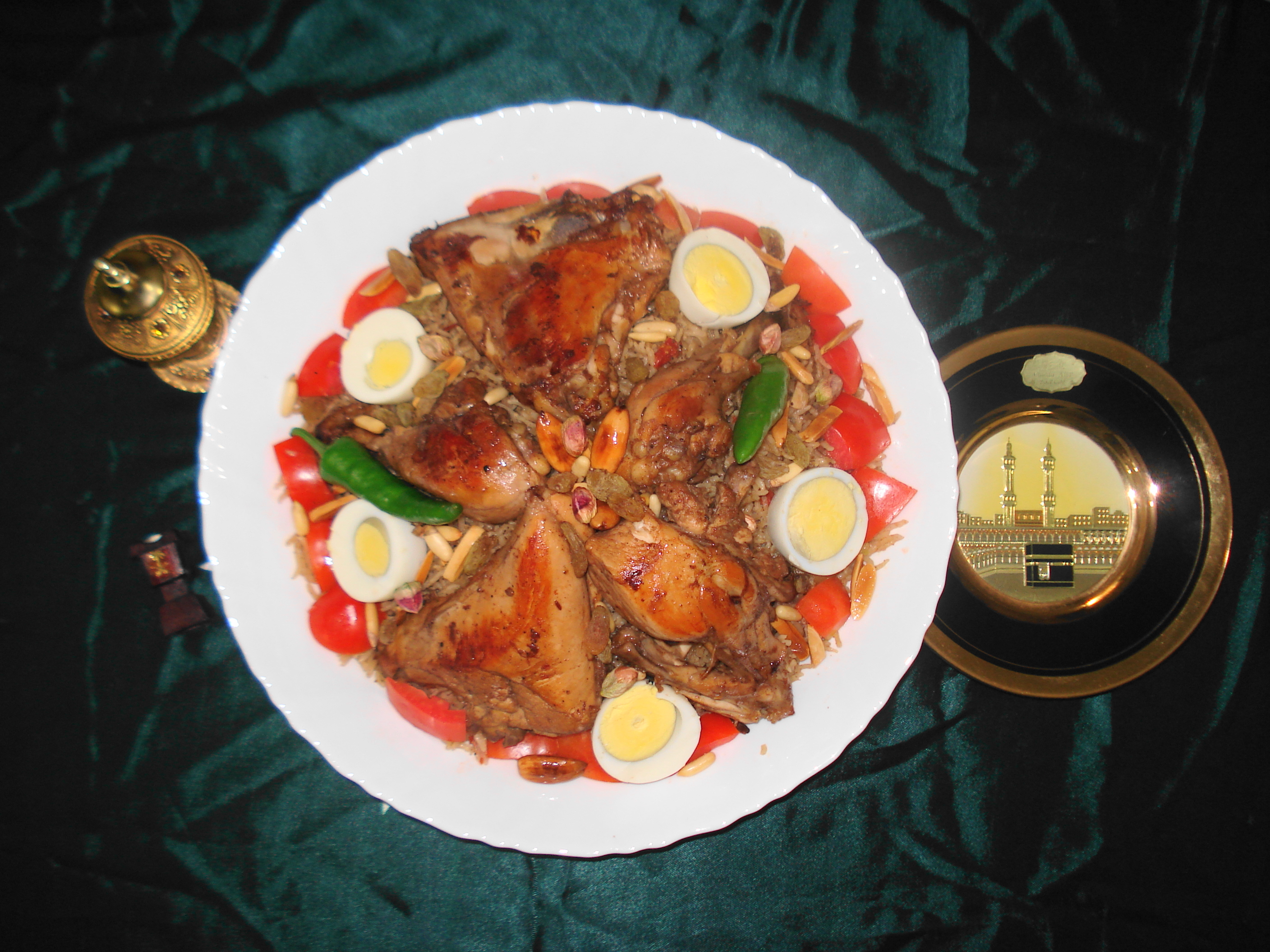 Plate with Kabsa, spiced rice, and meat