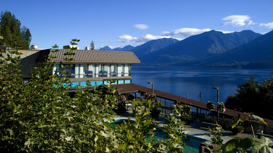 View from a balcony over the warm pool at Ainsworth Hot Springs and the adjacent lake