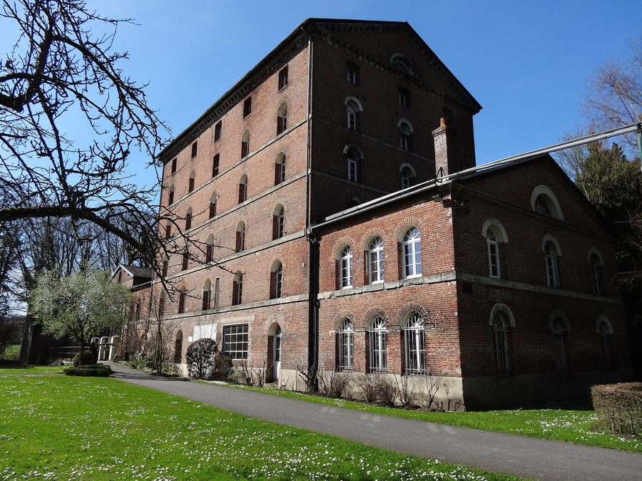Historic grain mill in Le Breuil-en-Auge, used as a Calvados distillery since 1950