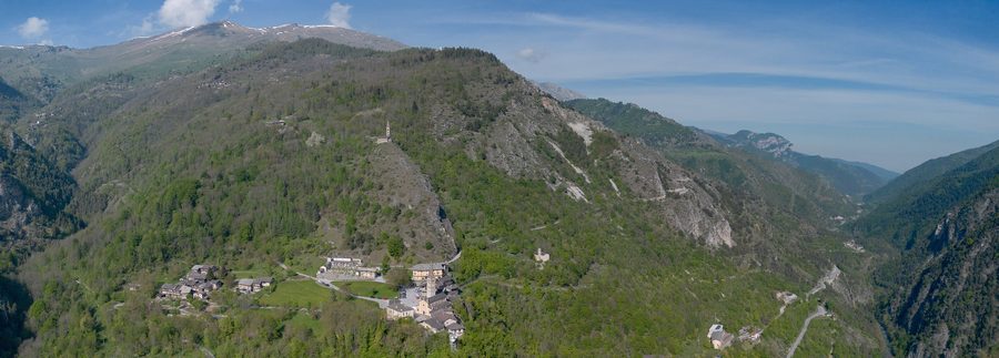 Aerial view of the village of Paschero and the valley in Stroppo, Maira Valley, Cuneo, Piedmont, Italy
