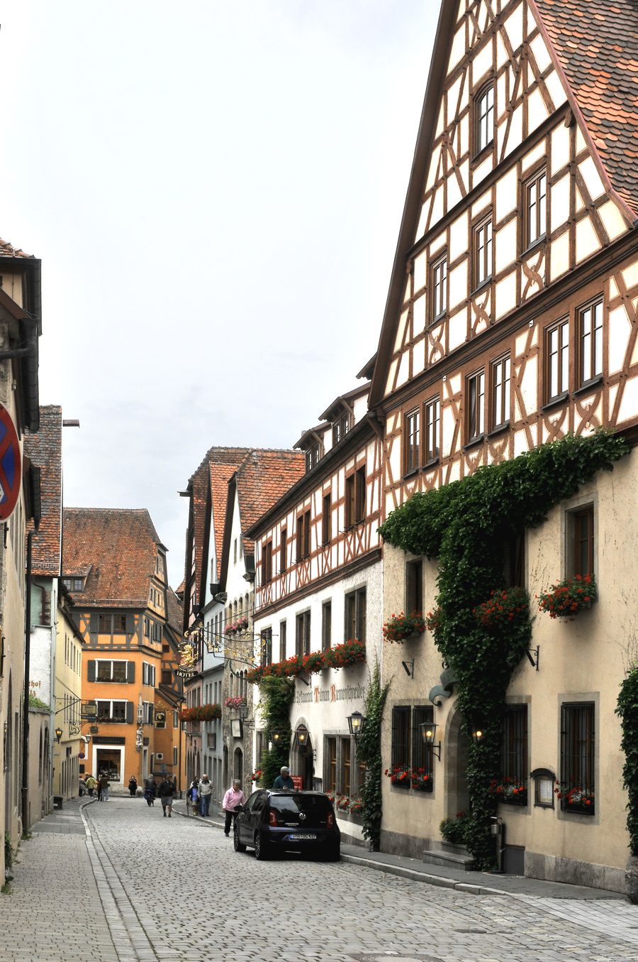 Historic old town street with half-timbered houses in Rothenburg ob der Tauber