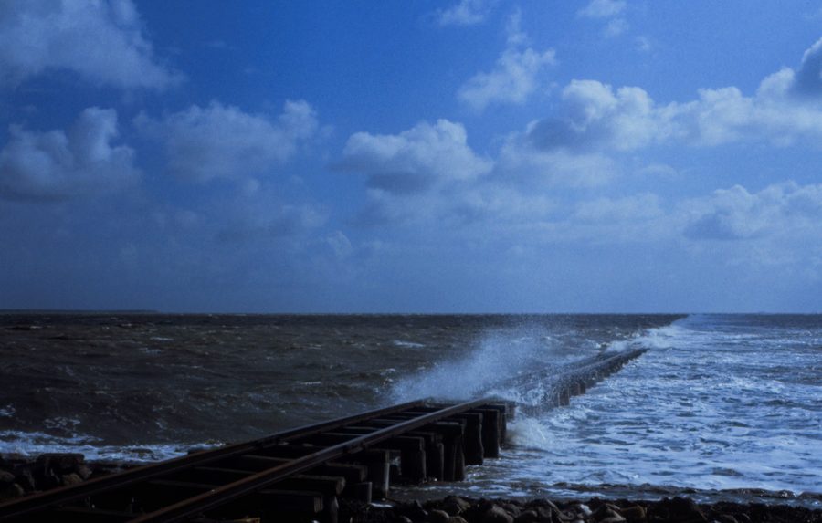 Flooded embankment of the Halligbahn between Dagebüll, Oland and Langeneß in the Wadden Sea
