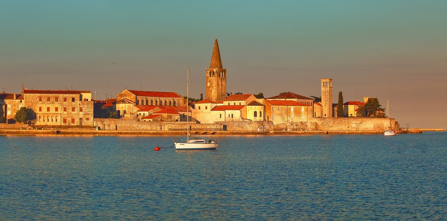 Panorama of Poreč and its coast at daybreak with the Euphrasian Basilica