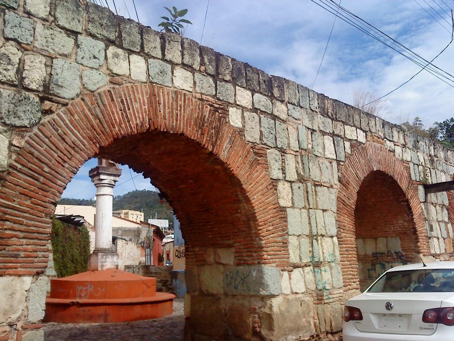 Historic aqueduct of San Felipe Del Agua with masonry arches