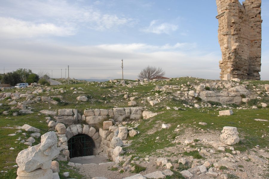 Apse of the ruined basilica and entrance to the cave church at Silifke Aya Tekla