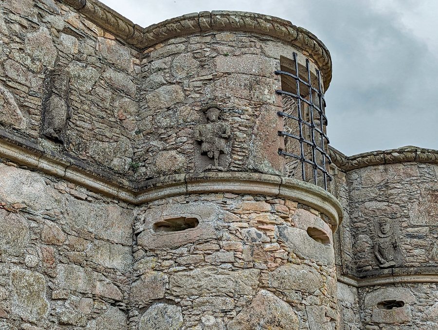 Exterior view of Tolquhon Castle in the landscape of Aberdeenshire