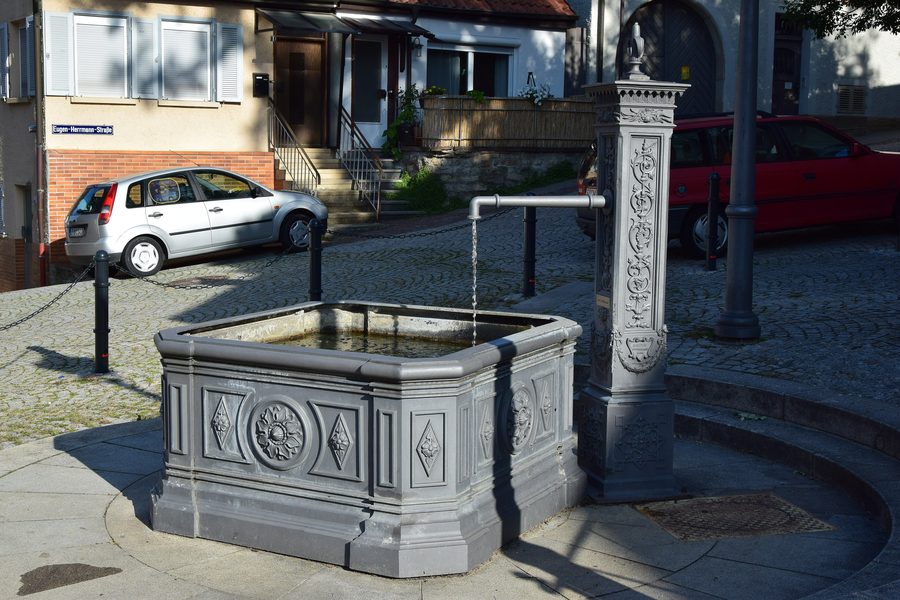Fountain in front of the Georgskirche in Schwieberdingen, district of Ludwigsburg