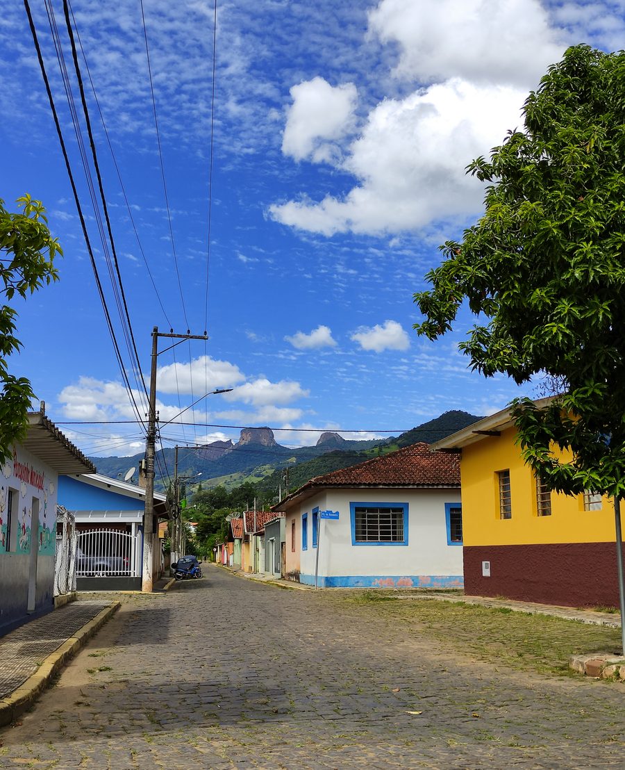 Empty street in the center of São Bento do Sapucaà with Pedra do Baú in the background