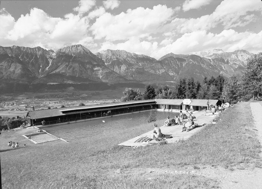 View from the Schönruh swimming pool in Aldrans of the Tyrolean mountain ranges