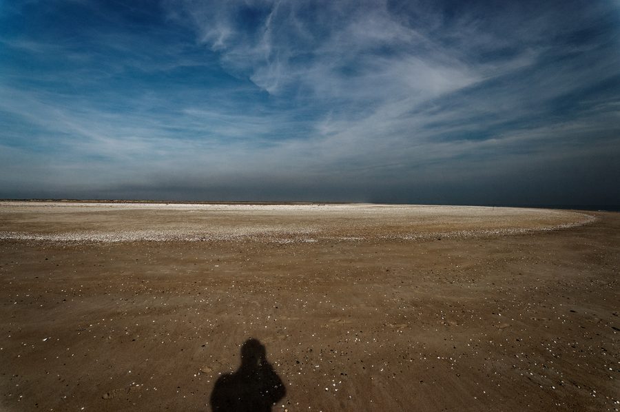 Wide North Sea beach with dune landscape at the southern end of the island of Texel.