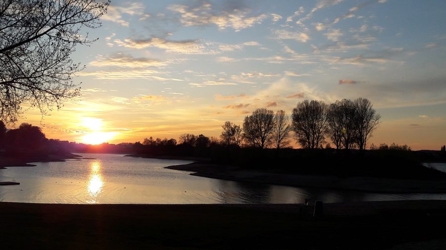 Beach at Giesbeek on the Rhederlaag at sunset