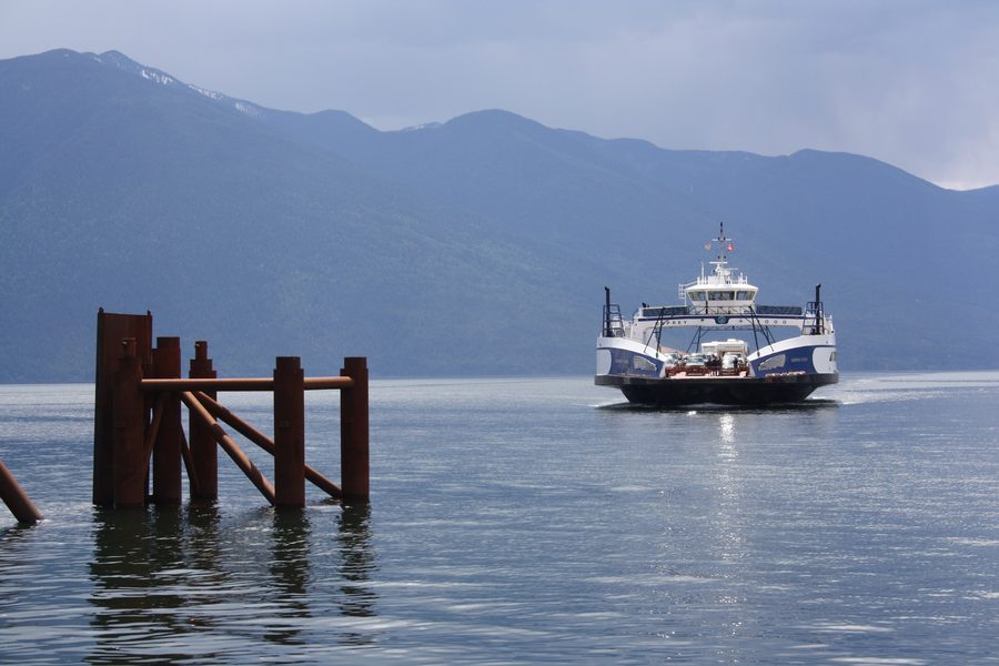 Ferry on Kootenay Lake with a mountain backdrop