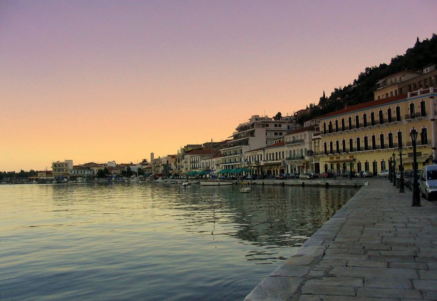 Harbor of Gytheio in the evening light with fishing boats and reflections in the water