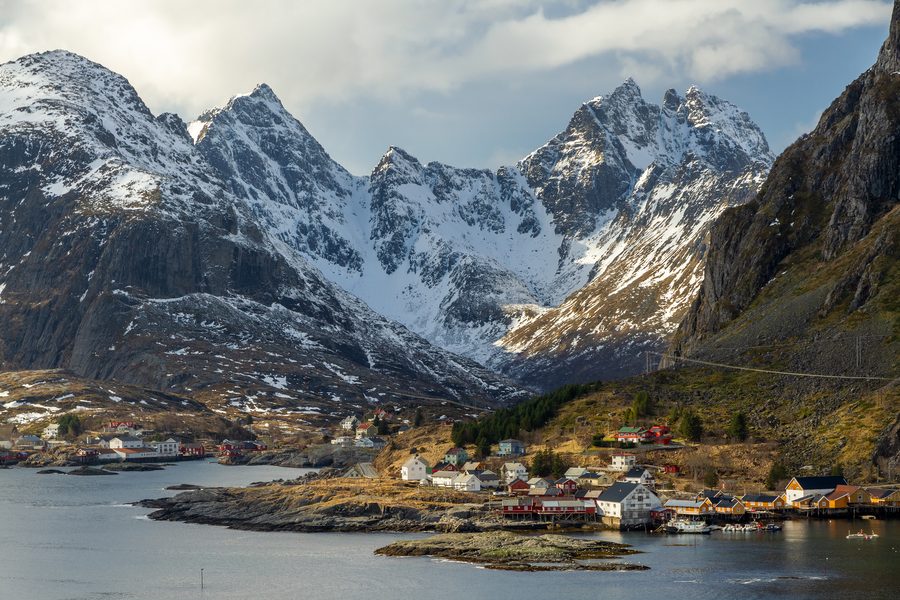 The fishing villages Tind and Ã… on the Lofoten in front of steep mountains.