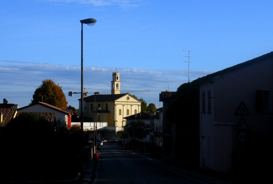 View of the center of Villa di Villa with the parish church